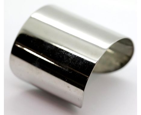 White metal Michael Kors cuff bangle. P&amp;P Group 1 (£14+VAT for the first lot and £1+VAT for subsequent lots) 