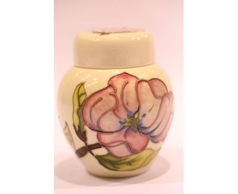 Small Moorcroft ginger jar in the Pink Magnolia pattern, H: 11 cm. P&amp;P Group 2 (£18+VAT for the first lot and £2+VAT for 