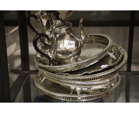 Five silver plated drinks and serving trays and a three piece silver plated tea set. P&amp;P Group 3 (£25+VAT for the first l
