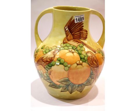 Very large Moorcroft modern twin handled fruit and finches vase signed WM. H: 38 cm. This lot is not available for in-house P