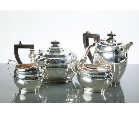 SILVER FOUR PIECE TEA SERVICE maker William Henry May, Chester 1940, hot water pot Birmingham 1940, of faceted rectangular fo