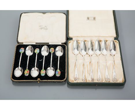 SET OF SIX GEORGE V SILVER GRAPEFRUIT SPOONS
maker Robert Stewart, London 1925, elongated bowls, handles with bow and swag de