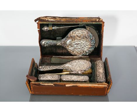 MATCHED EDWARDIAN SILVER VANITY SET
maker William Aitken, Birmingham 1902-1903, comprising hand mirror, hair brush, small clo