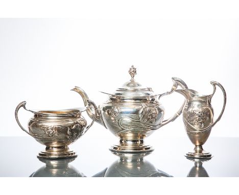 ATTRACTIVE EDWARDIAN ART NOUVEAU SILVER THREE PIECE TEA SERVICE
maker R & W Sorley, London 1901, cream dated 1899, in Scottis