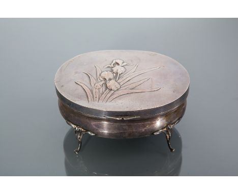 EDWARDIAN SILVER OVAL TRINKET BOX
maker William Comyns & Sons, London 1903, lid embossed with attractive flag iris design, on