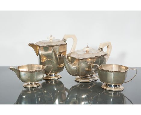 ATTRACTIVE ART DECO IVORY HANDLED SILVER FOUR PIECE TEA SERVICE
maker Wilson & Sharp, Sheffield 1933, silver jubilee mark, of