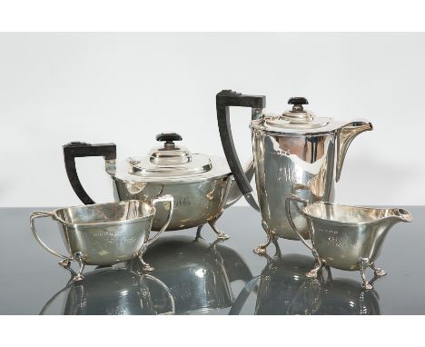 SILVER FOUR PIECE TEA SERVICE
maker Duncan & Scobbie, Birmingham 1937, of rectangular form, each on four short legs and with 