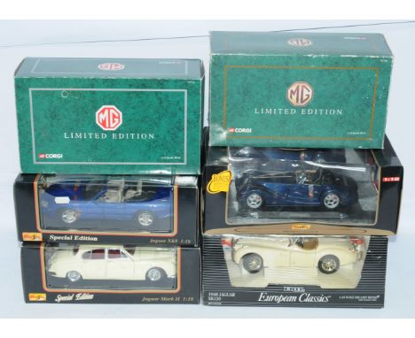 Maisto, Corgi and similar, a mixed boxed 1/18 scale group to include, Corgi 95106 MGB, Maisto Jaguar XK8 and others similar. 