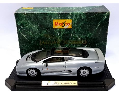 Maisto, a boxed 1:12 Scale 33201 1992 Jaguar XJ220. Although unchecked for completeness condition appears Good in a generally