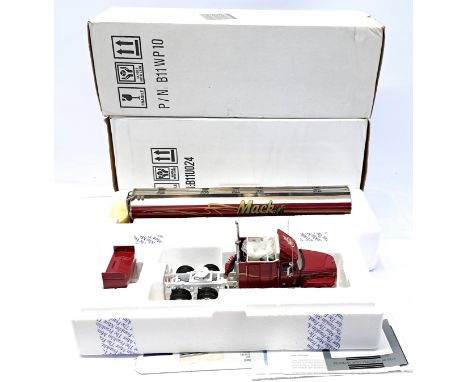 Franklin Mint, a boxed 1:32 Scale Mack Truck and Tanker Trailer pair. Although not checked for completness conditions general