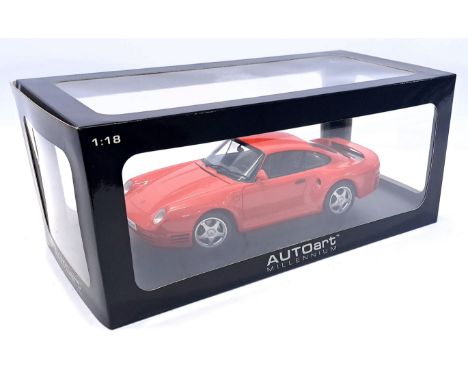 Autoart, a boxed 1:18 Scale Porsche 959 Red. Although not checked for completness conditions generally appear Excellent to Ne