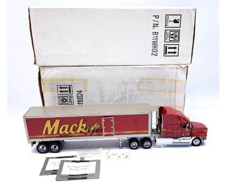 Franklin Mint, a boxed 1:32 Scale Mack Truck and Refrigeration Trailer pair. Although not checked for completness conditions 