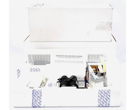Franklin Mint, a boxed 1:32 scale 1979 Freightliner and Freightliner Trailer pair. Although not checked for completness condi