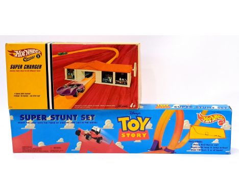 Hot Wheels "Mattel", a boxed pair to include 16539 "Toy Story" Super Stunt Set and H9605 "Hot Wheels Classics" Super Chaser S