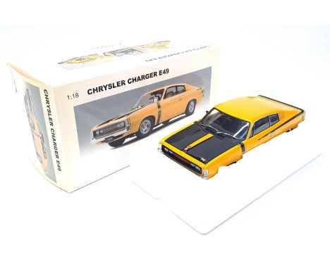 Autoart, a boxed 1:18 Scale Chrysler Charger E49 Sunfire Metallic 71504. Although not checked for completness conditions gene