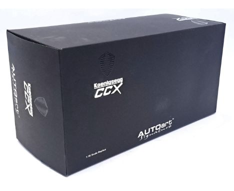 Autoart, a boxed 1:18 Scale Koenigsegg CCX 79002 Black. Although not checked for completness conditions generally appear Exce
