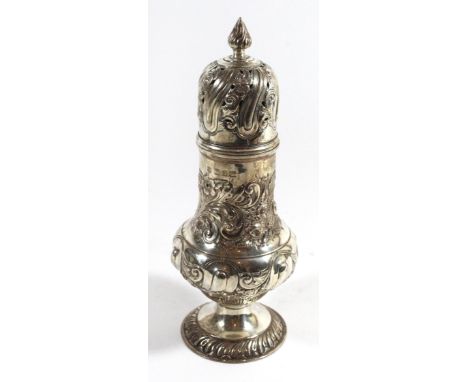 A late Victorian silver sifter
With foliate embossed pattern throughout and tapered finial, Vale Brothers &amp; Sermon, Birmi