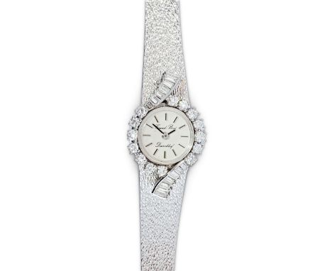 Damen-Schmuck-Armbanduhr  750/f. Weißgold. Grand Boré, Düsseldorf. Mit 14 Brillanten von zus. ca. 0,83 ct (top wesselton-lupe
