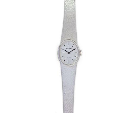 Tissot-Vintage-Damenarbanduhr  750/f. Gold. Saphir. Oval, mit silberfarbenem Zifferblatt. Bez. An Weißgoldgliederband nach Ve