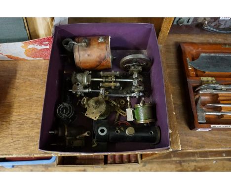 A mixed lot of live steam parts, to include a piston, engine and boiler.&nbsp; 