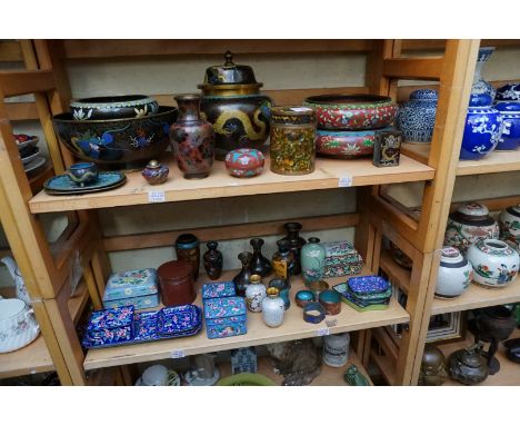 A collection of Chinese and Japanese cloisonne and other enamel items. (two shelves) 