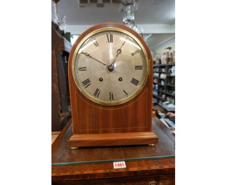 A late 19th/early 20th century mahogany and line inlaid bracket type clock,&nbsp;the silvered dial inscribed 'Fattorini &amp;