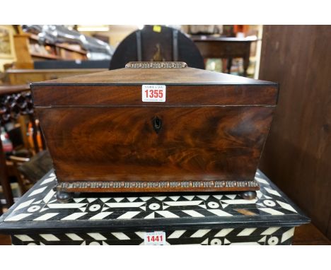 A 19th century mahogany sarcophagus tea caddy,&nbsp;33cm wide.&nbsp; 