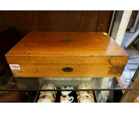 A Victorian mahogany games compendium,&nbsp;the hinged top opening to reveal a chess set, dominoes, backgammon board, and var