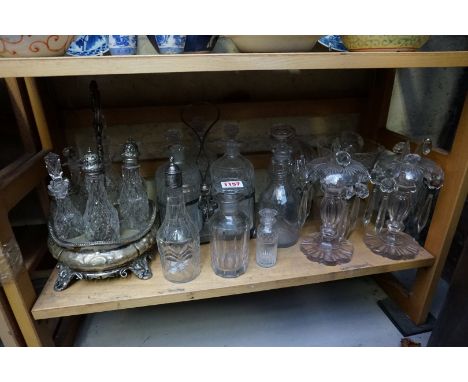 An interesting group of antique glassware, to include: a electroplate cruet stand; a pair of glass lustres; an electroplate t