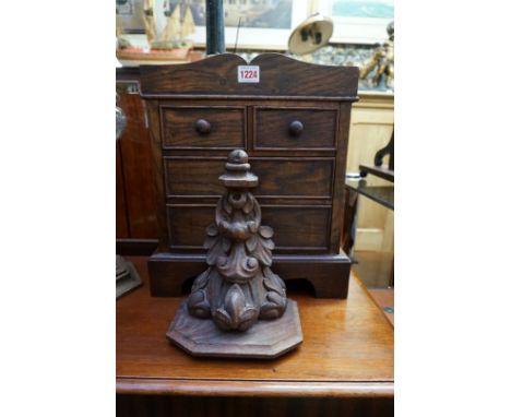 A miniature oak chest of drawers, 34.5cm wide; together with a carved oak wall bracket. 