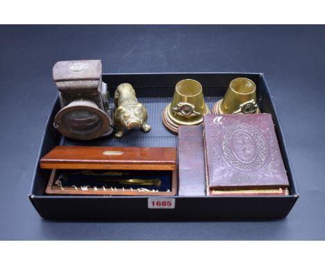 An interesting mixed lot, to include a Georgian mahogany cased compass, 13cm wide; an ambrotype; a brass bulldog; and a pair 