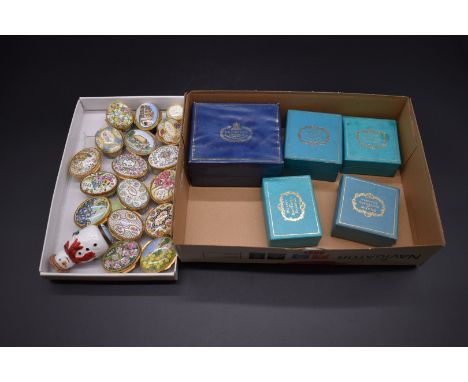 Eighteen Halcyon Days enamel boxes, to include a novelty snowman example.&nbsp; 
