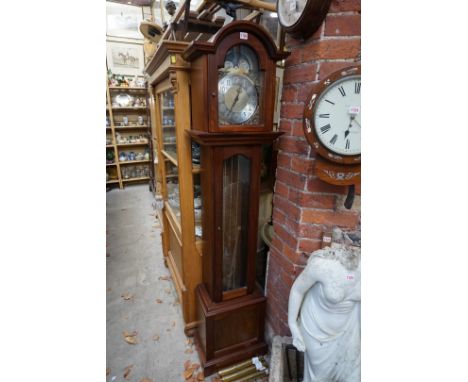 A reproduction mahogany small longcase clock, chiming on twelve straight gongs, with moonphase arch, labelled 'Made By Guerns