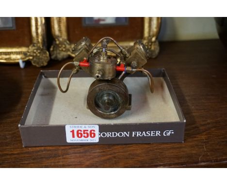 A scratch built twin cylinder stationary steam engine, 9cm high. 
