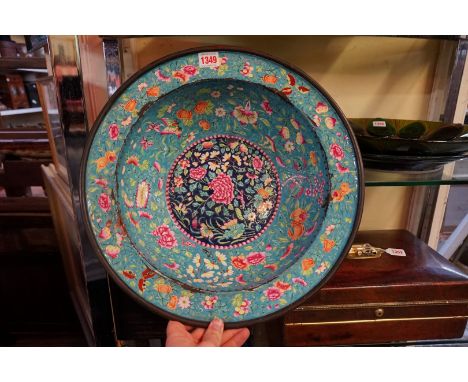 A Chinese Canton enamel basin,&nbsp;18th century, painted in the famille rose palette, with fruit, insects and flowers, 41.5c
