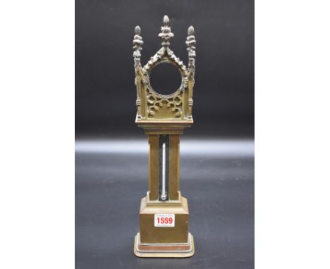An unusual antique cast brass miniature longcase clock case,&nbsp;in the Gothic style, with thermometer to trunk, 36.5cm high