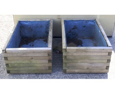 A pair of rectangular hutton wooden planters. L80cm x D51cm x H34cm Condition Report: plasatic lined, construction good as re