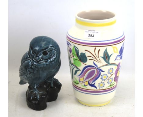 Two pieces of mid-century Poole Pottery. Comprising a vase, H22cm and an owl ornament in blue glaze, H18cm