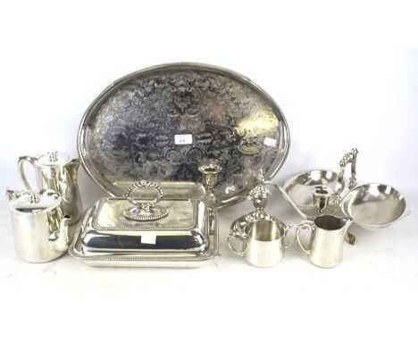 An assortment of 20th century silver plate. Including an oval tray with pierced details, a rectangular tureen, a two branch c