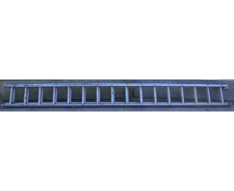 An Eclipse large extending aluminum two-section ladder. Sixteen rungs. 