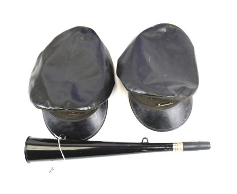 A British Railways horn and two vintage caps. The horn by ACME, L38cm, both black leather caps by J. Compton Sons &amp; Webb 