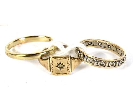 Three 9ct gold and yellow metal rings. Including a signet ring, 5.5g gross