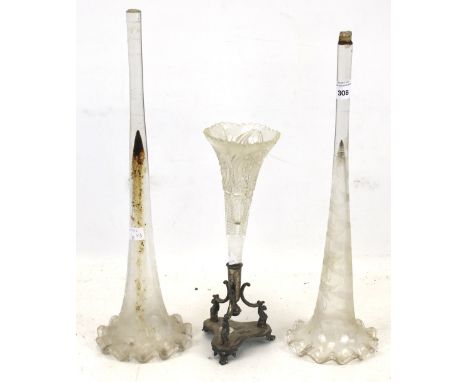 Three Victorian glass trumpet vases. One has a silver plated tripod base. Max. H43cm