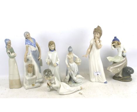 A collection of assorted Spanish porcelain figurines. Including Nao and others. Max. H29cm