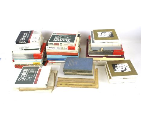 A box of assorted reel to reel magnetic recording tape, classical music books. Including Scotch 203, Emitape, pre-recorded To