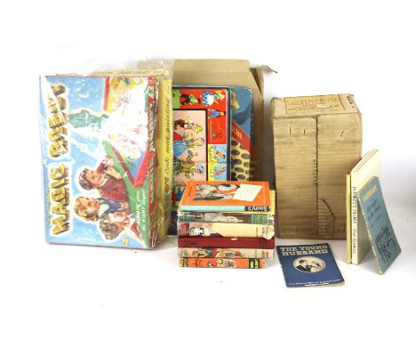 An assortment of vintage children's games and books. Including a Mettype Junior toy typewriter boxed, a 'Magic Robot' game, E