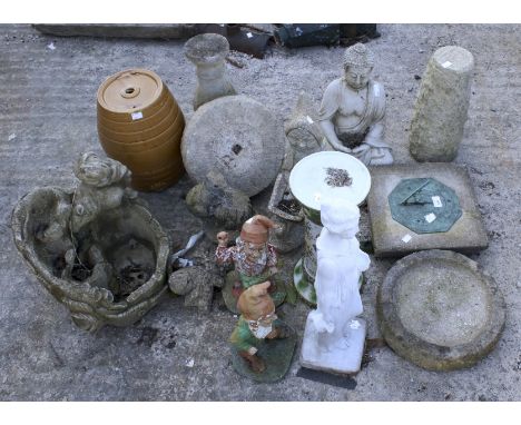 A quantity of assorted vintage garden ornaments. Including gnomes, statues, sun dial and a glazed ceramic barrel, etc. Max. H