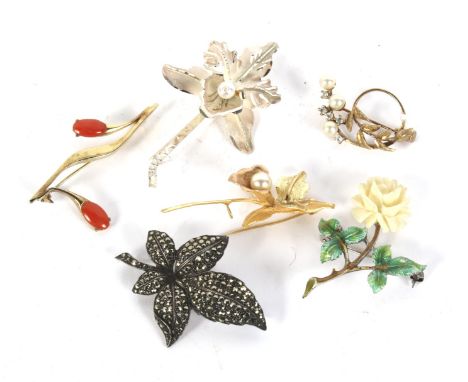 Six floral brooches. Including white metal, enamel and coral examples