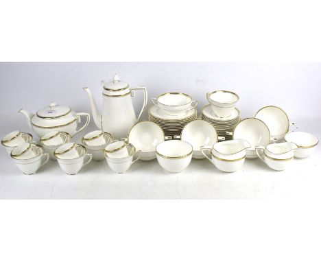 A Royal Worcester part tea and coffee service in the 'Viceroy' pattern. Comprising six teacups and saucers, five coffee cups 