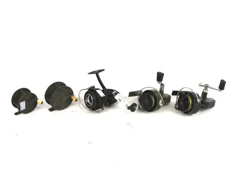 Five vintage fishing reels. Comprising two brass fly reels and three course fishing reels